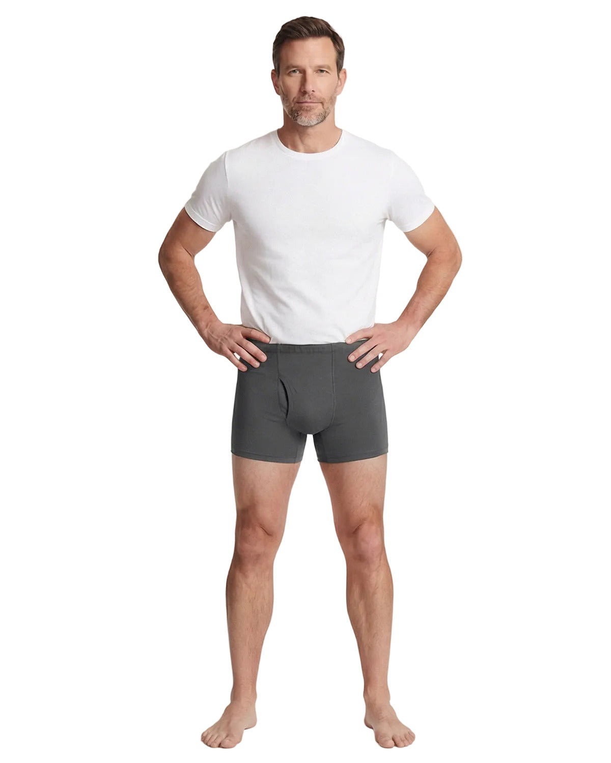 Man wearing gray boxer briefs and a white t-shirt on a white background