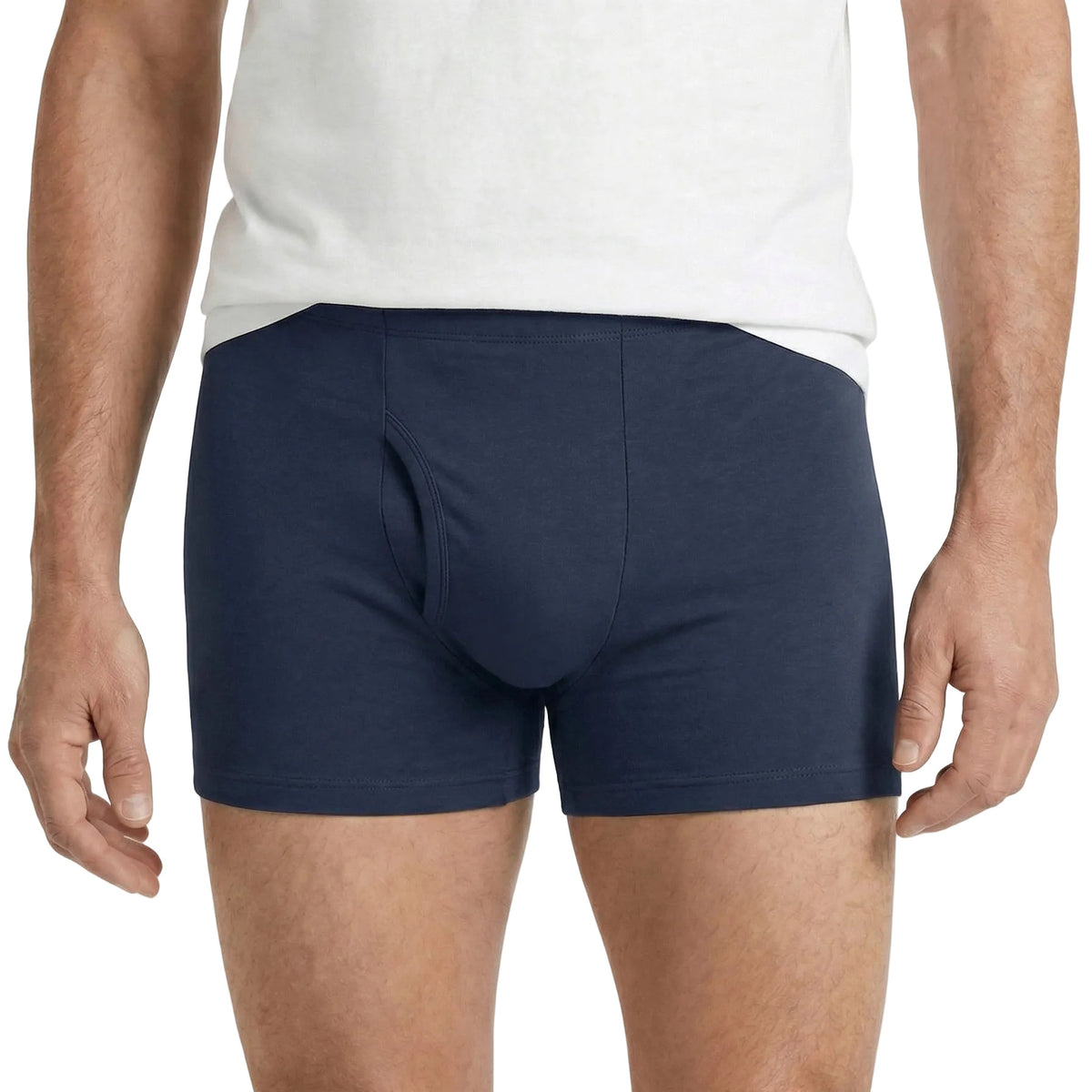 Navy blue boxer briefs worn by a person on a white background