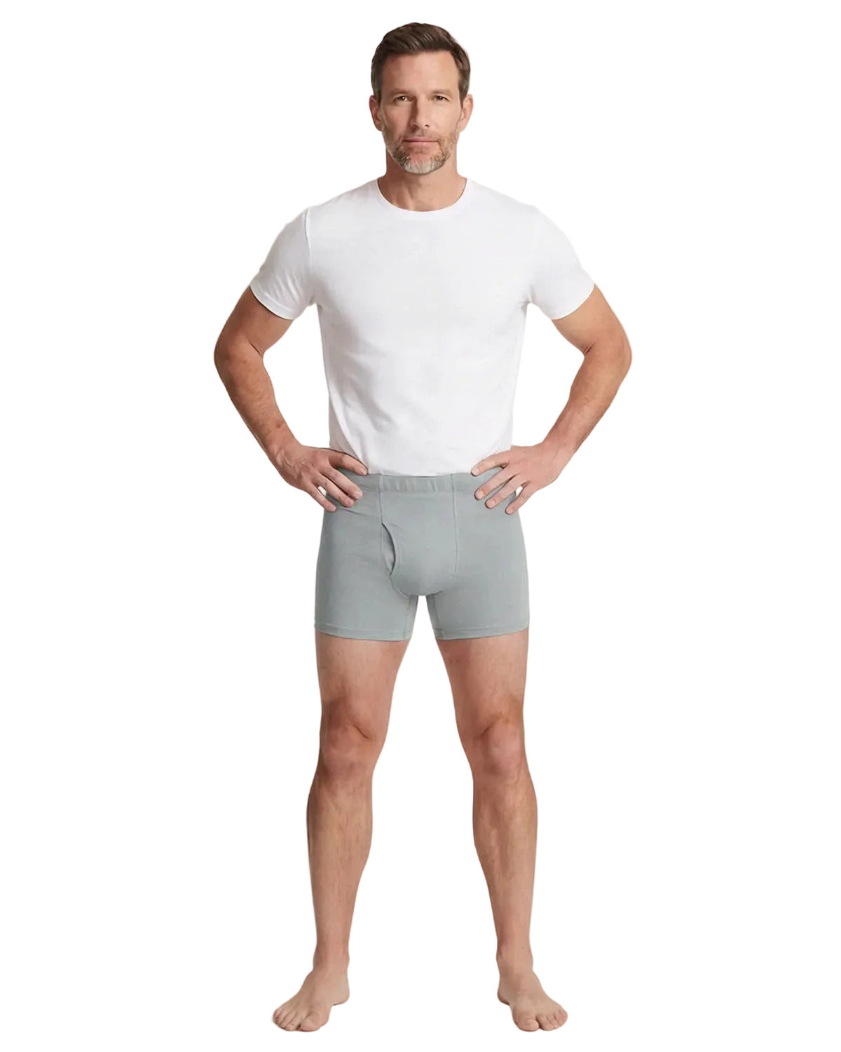 Man wearing a white t-shirt and gray boxer briefs on a white background
