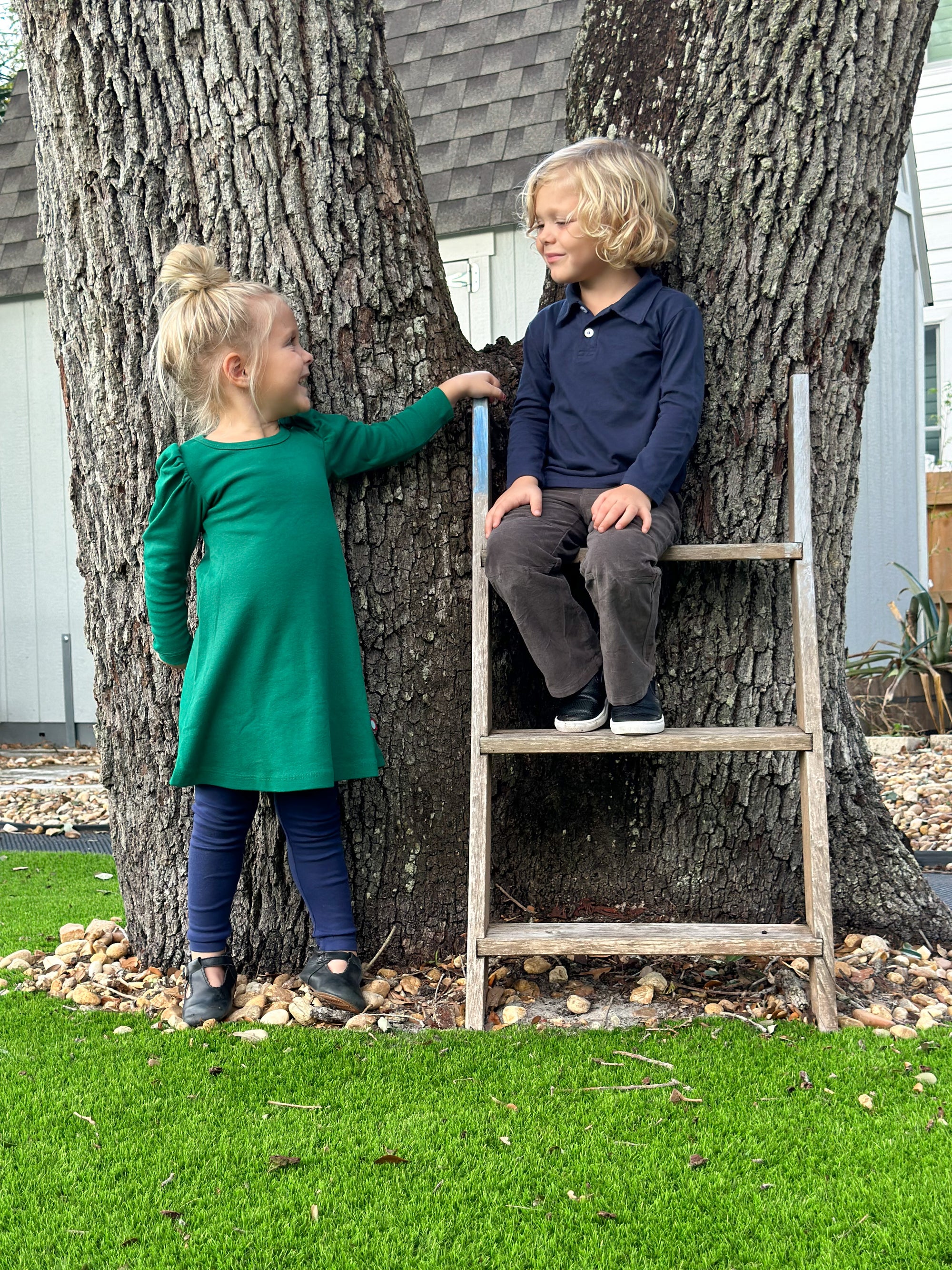 Boy and Girl wearing city threads sensory friendly comfortable clothing while playing outside on Thanksgiving day.