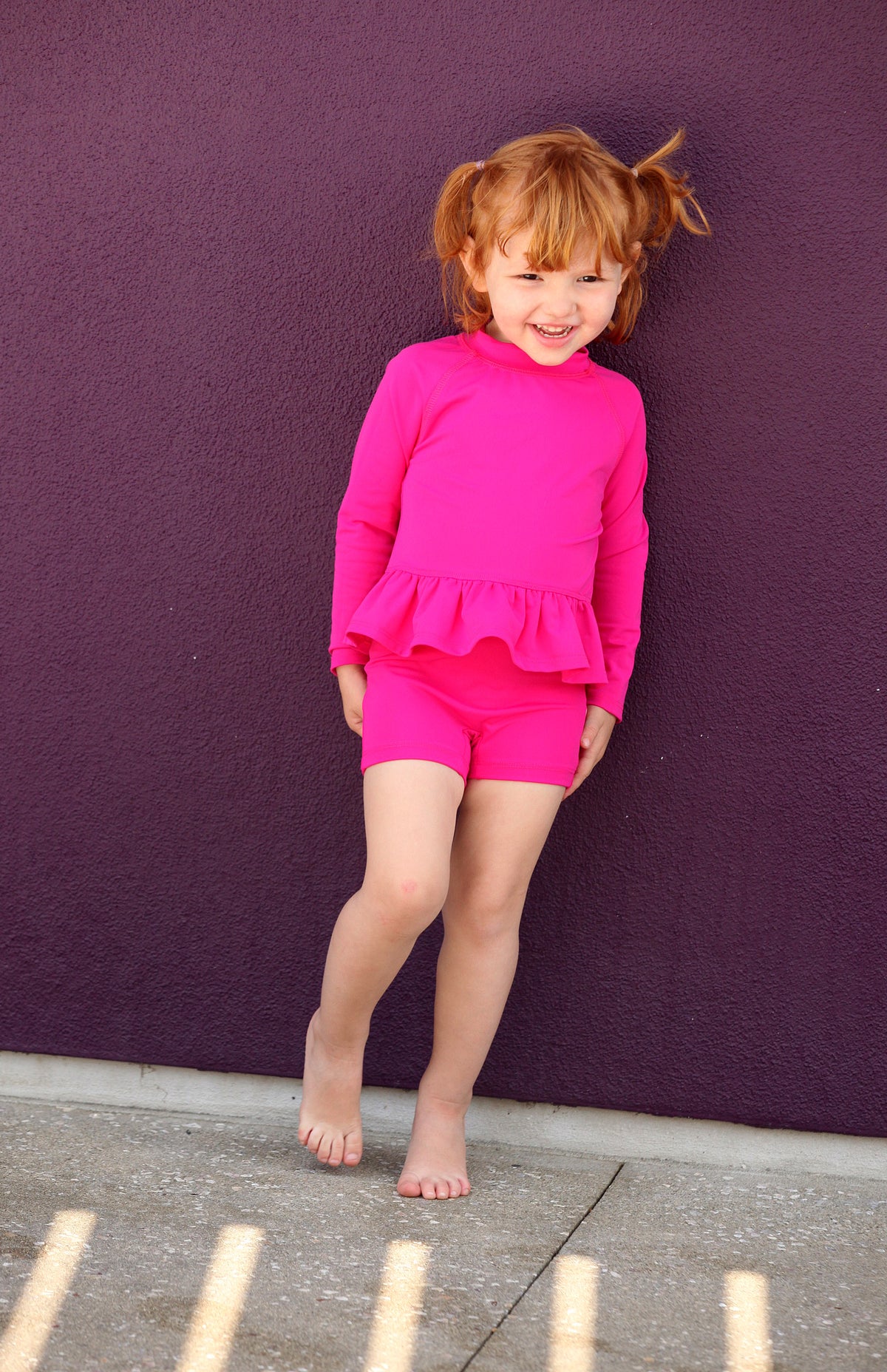 Girls UPF 50+ Swim Boy Shorts  | Black w. Bubblegum Stitch