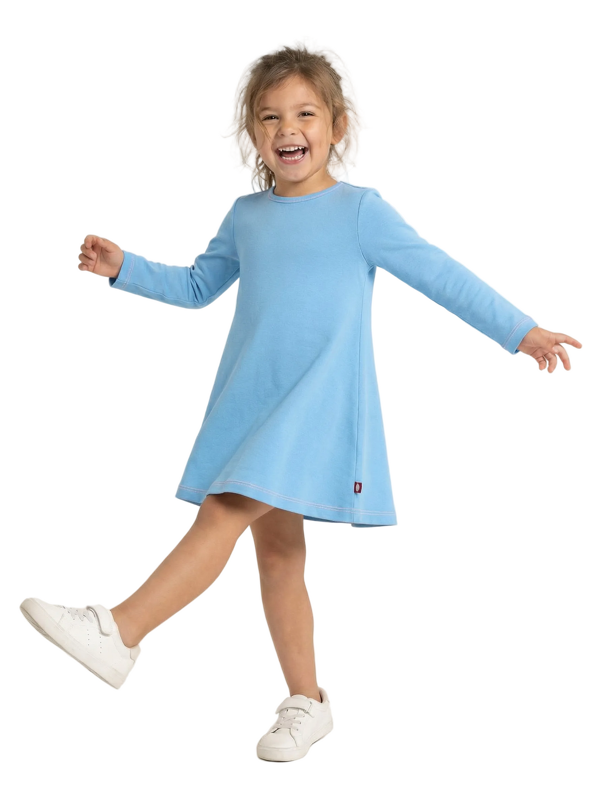 Child wearing a light blue dress on a white background
