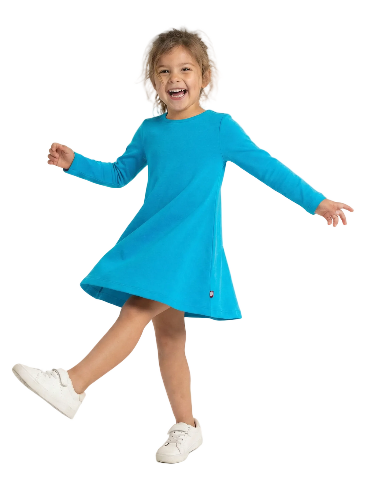 Child wearing a blue dress on a white background