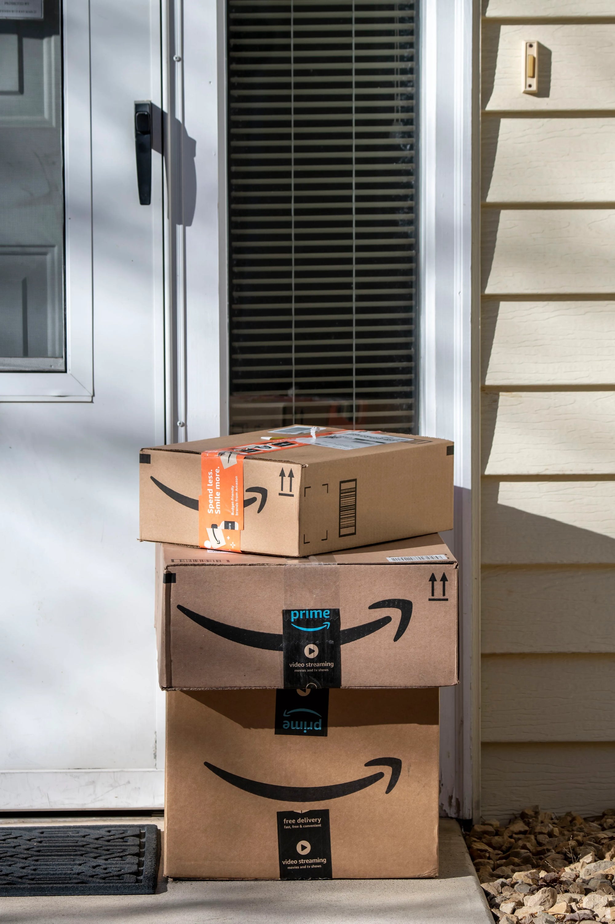 Amazon boxes on a doorstep