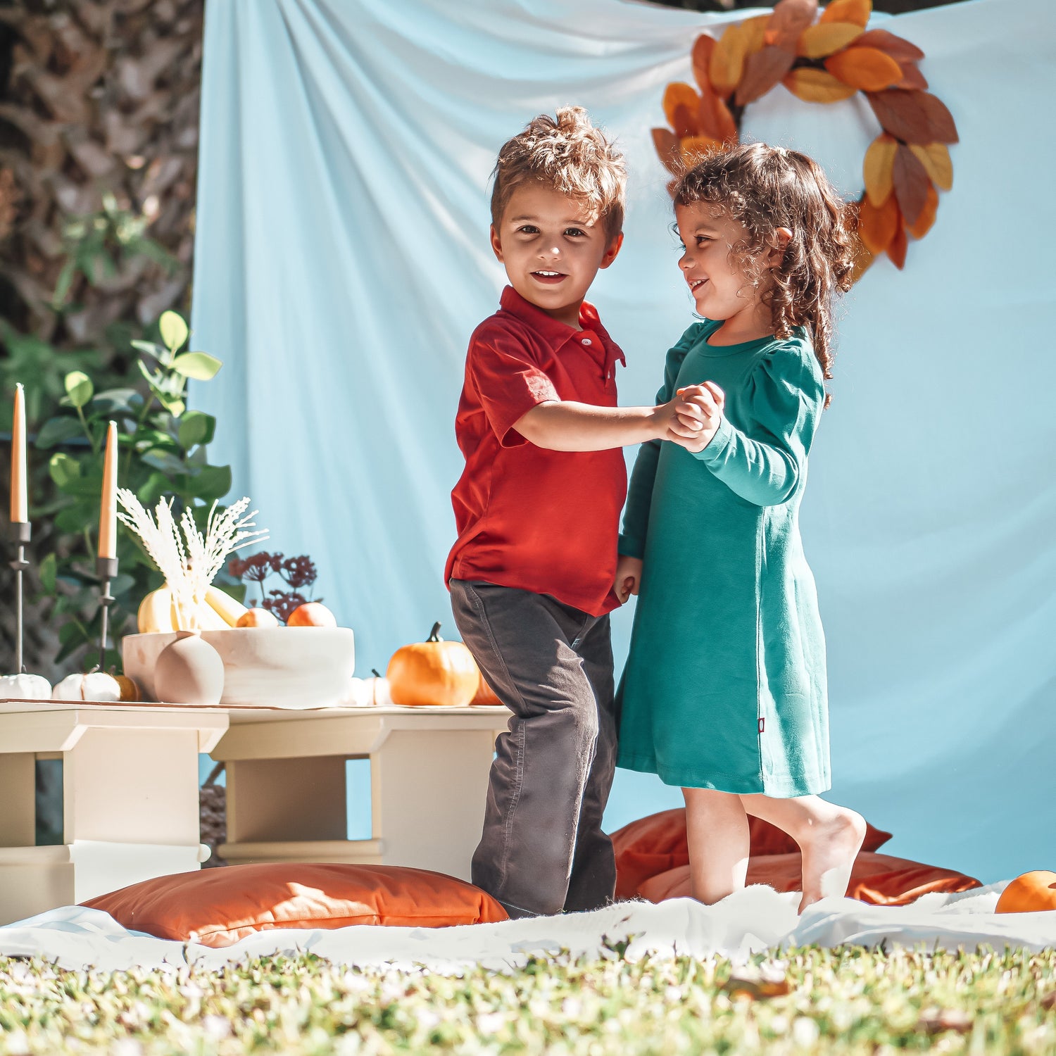 Boy and Girl dancing in city threads sensory friendly clothing outdoors
